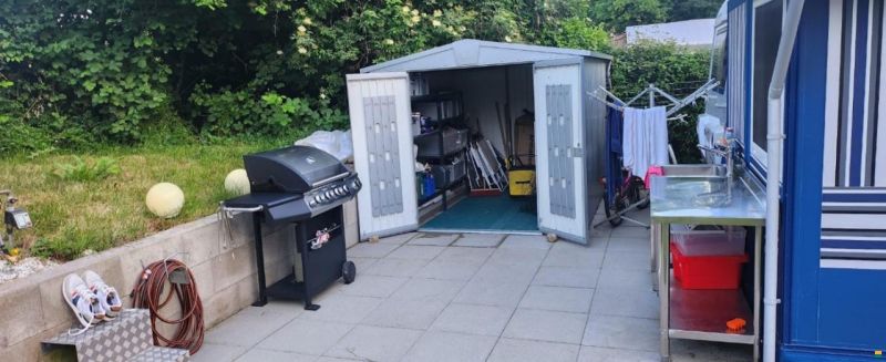 Wilk Wohnwagen mit Holzvorbau