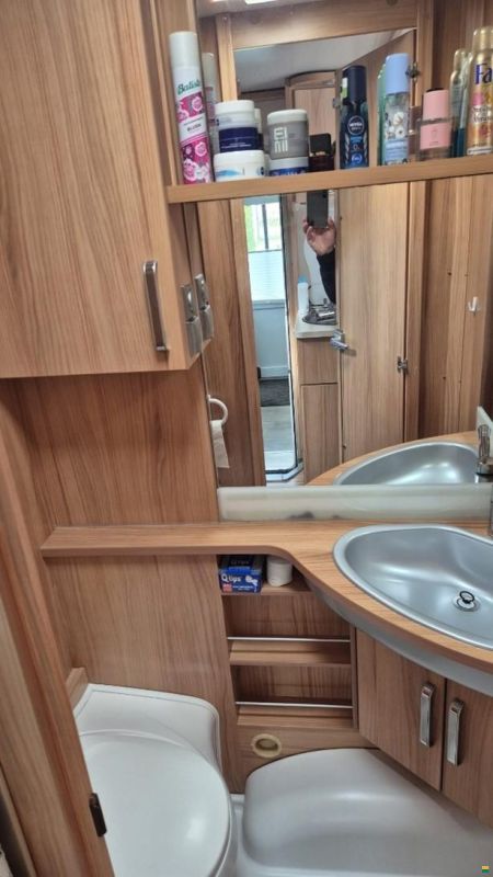 Wilk Wohnwagen mit Holzvorbau