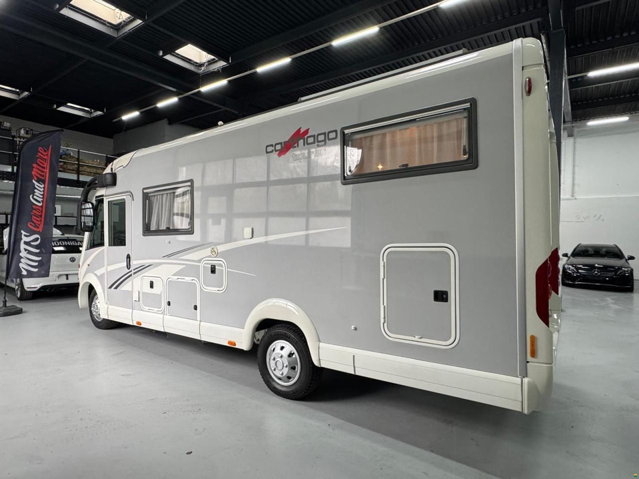 Carthago TOURER-LÄNGSBETT-HUBBETT-ALCOTIEF