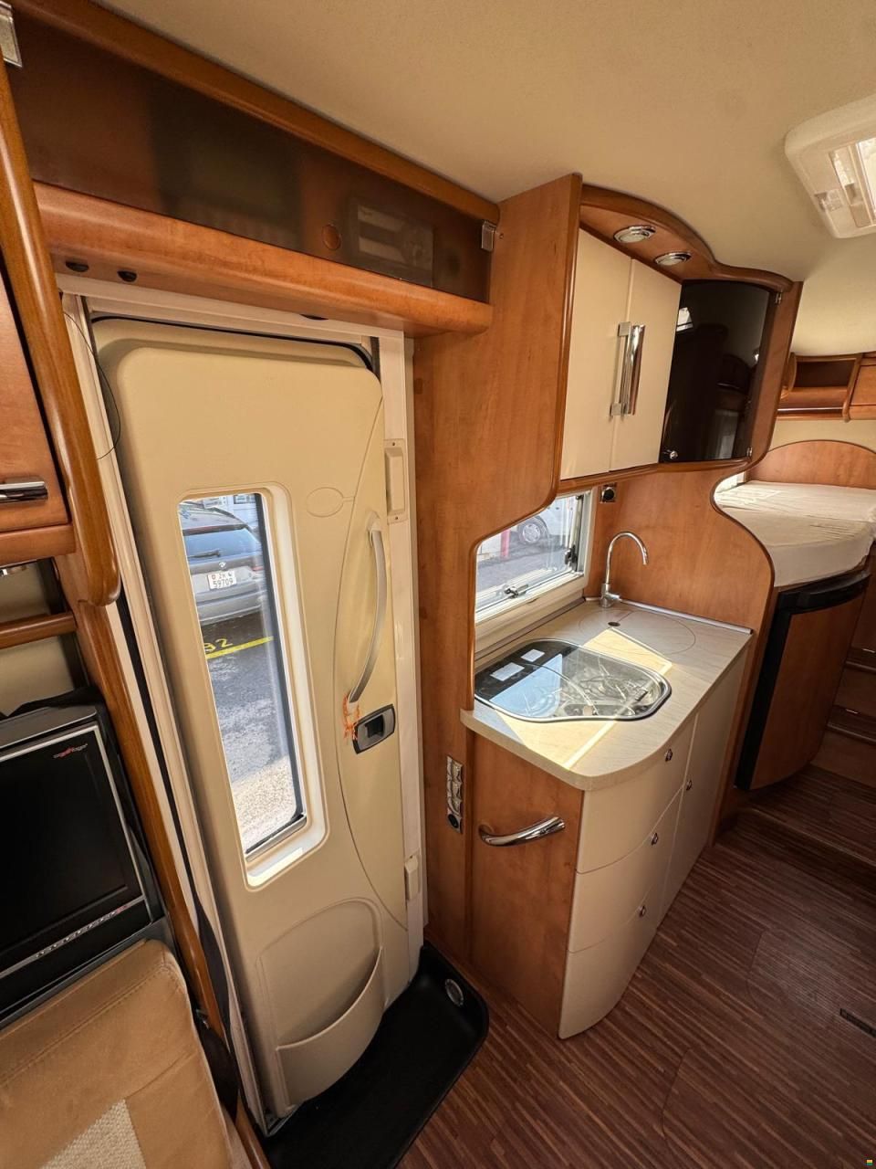 Carthago TOURER-LÄNGSBETT-HUBBETT-ALCOTIEF