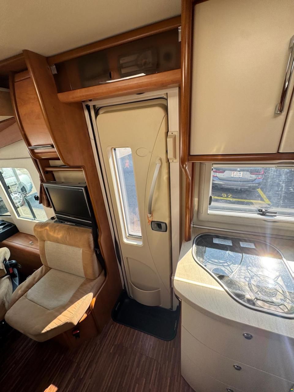 Carthago TOURER-LÄNGSBETT-HUBBETT-ALCOTIEF