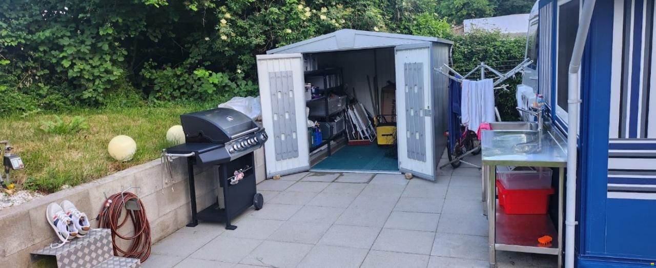 Wilk Wohnwagen mit Holzvorbau