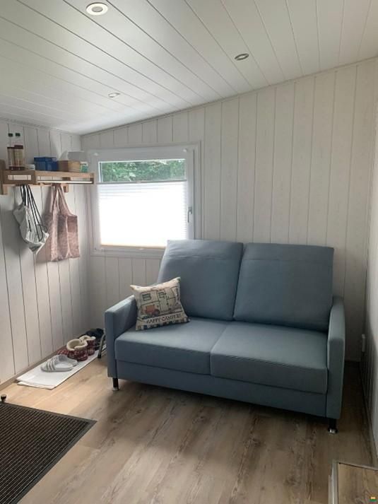 Wilk Wohnwagen mit Holzvorbau