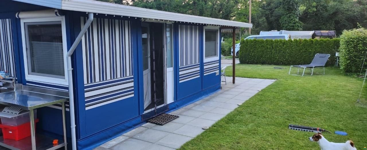 Wilk Wohnwagen mit Holzvorbau