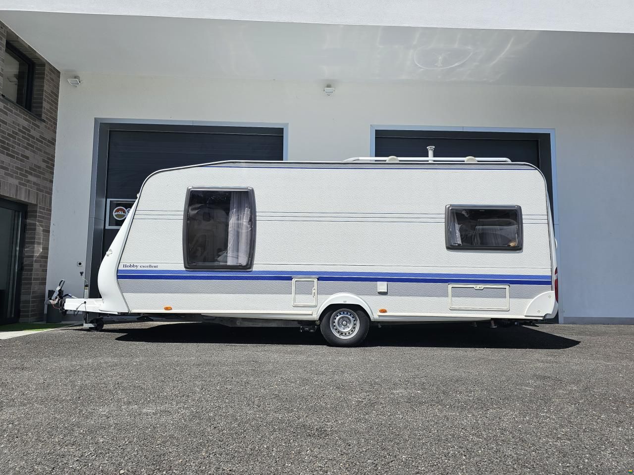 Hobby Excellent mit Queensbett, Klima, Mover!